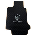 Black Stitched Leather Floor Mats with Logo for Maserati GranTurismo MC (2009-2010) | Beige Trim - AutoWin