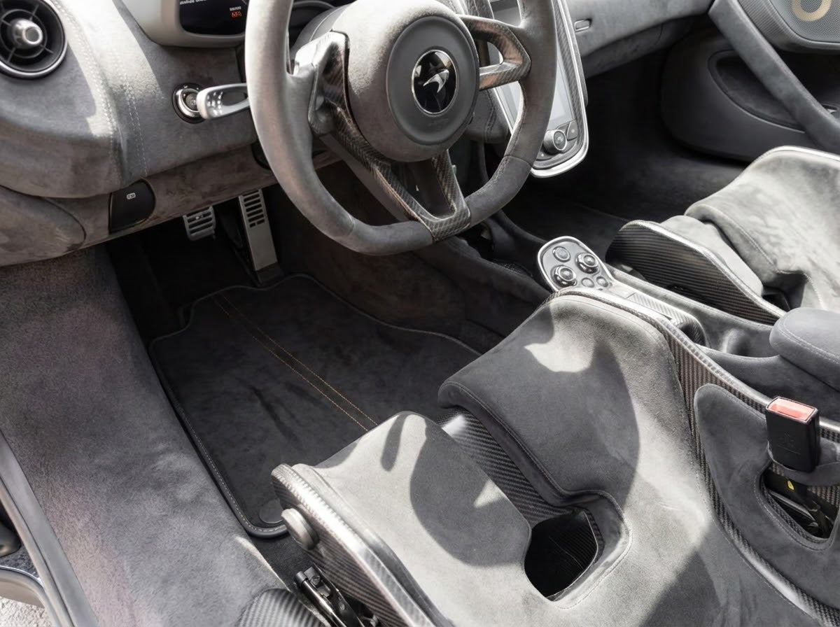 Interior look of floor mats for Floor Mats For McLaren 600LT (2018-2020) Alcantara Black Tailored Carpets With Orange Sewing