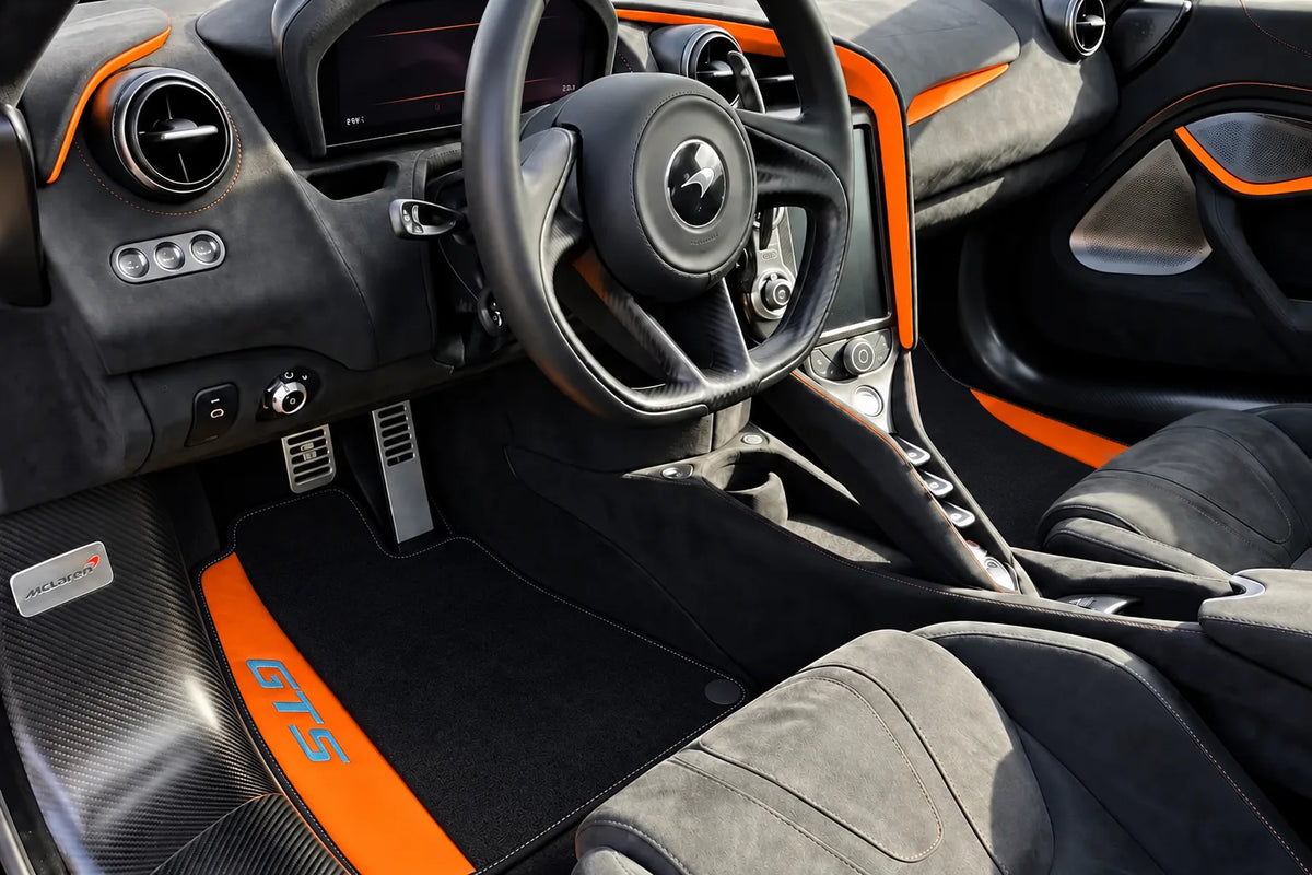 Black Carpet Floor Mats with Orange Leather for McLaren 750S GTS (2023-2026) inside the vehicle