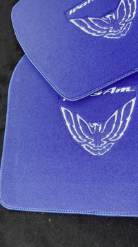 Blaue Fußmatten für Pontiac FireBird (1993–2002) mit Trans Am-Logo