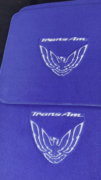 Blaue Fußmatten für Pontiac FireBird der dritten Generation (1982-1992) mit Trans Am Logo
